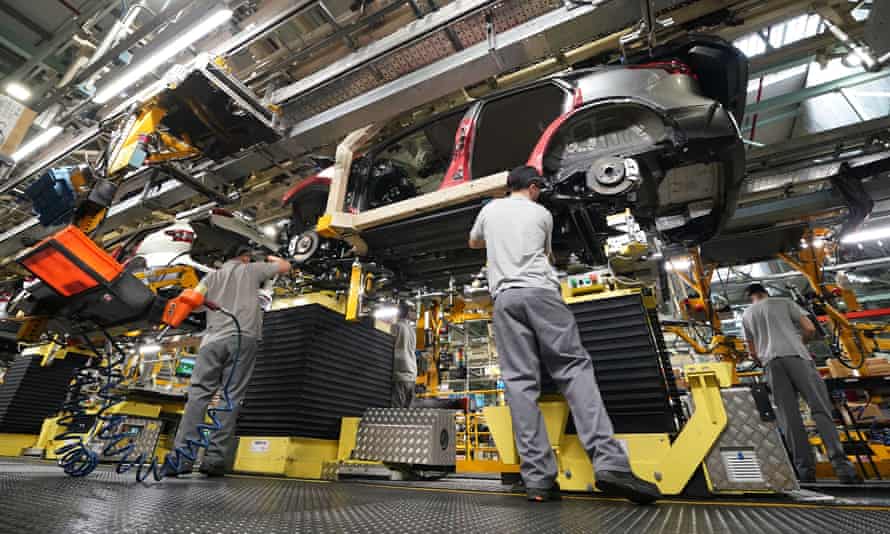 Workers on the production line at Nissan’s factory in Sunderland