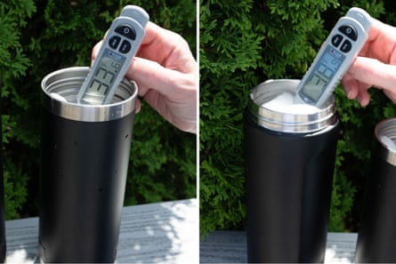 thermometer inside two black water bottles, one reading 33.6F and one reading 38.9F