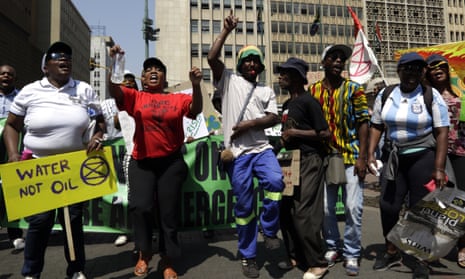 Climate protesters demonstrate outside the local government legislature’s offices in Johannesburg, South Africa