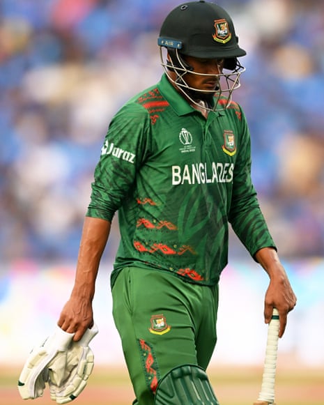 Nasum Ahmed of Bangladesh makes their way off after being dismissed.