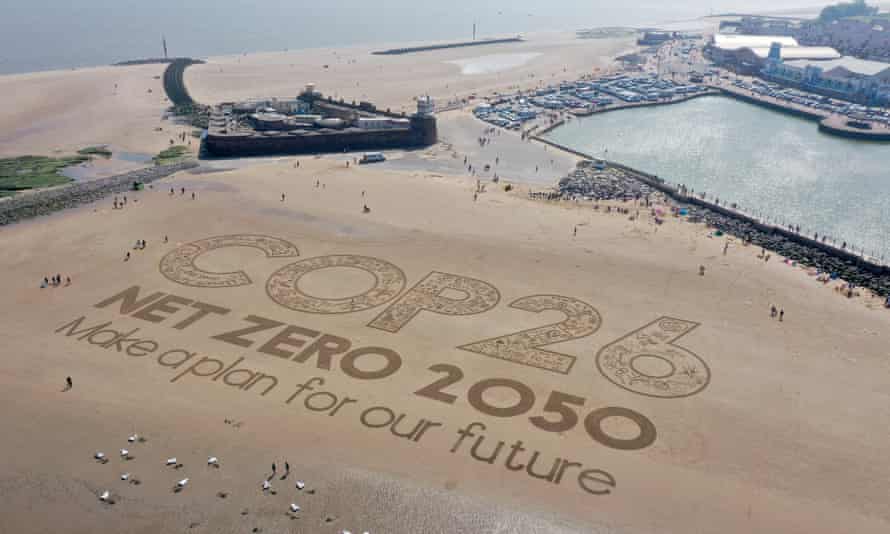 A sand artwork highlighting the upcoming Cop26 global climate conference in Wirral, Merseyside, May 2021