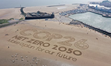 A sand artwork highlighting the upcoming Cop26 global climate conference in Wirral, Merseyside, May 2021