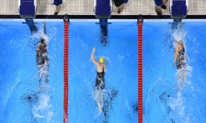 Simone Manuel (left) and Penny Oleksiak (right) tie for first place