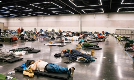 People rest at a cooling station during a heatwave in Portland, Oregon, in June 2021.