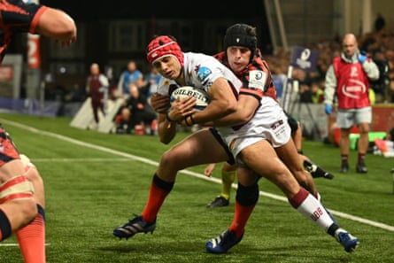 Gloucester's centre Seb Atkinson tackles the Bordeaux wing Louis Bielle-Biarrey