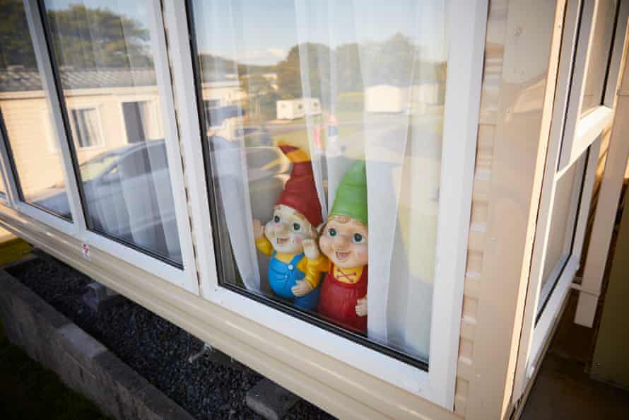 Gnomes in a static caravan window