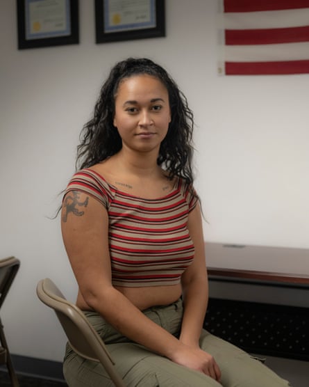 Young woman in stripped crop top and green pants