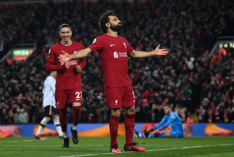 Salah celebrates after scoring.