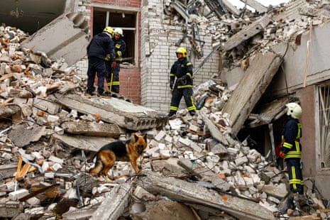 Rescuers work at the site of a destroyed building after a Russian missile strike in Chernihiv, Ukraine, on Wednesday.
