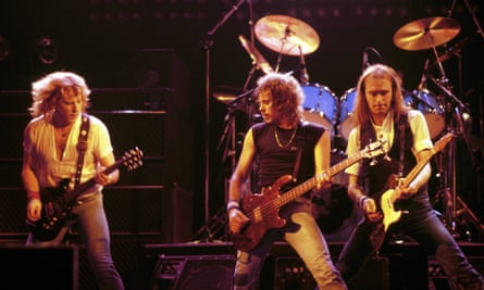 Status Quo … Alan Lancaster (centre) with bandmates Rick Parfitt (left) and Francis Rossi in 1984.