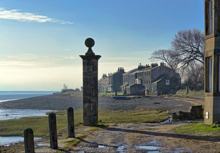 Some houses by a beach