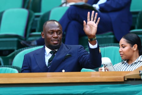Usain Bolt and Kasi Bennett in the Royal Box on Centre Court.