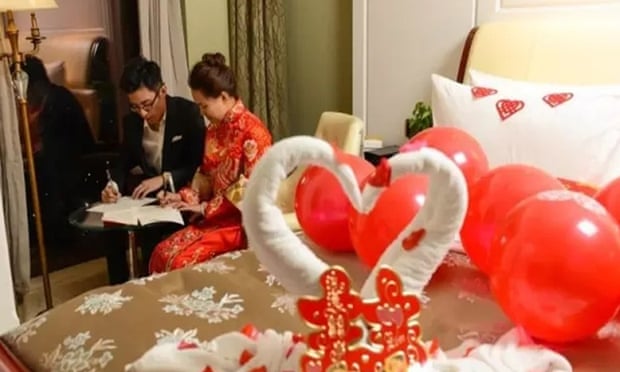 Photographs of the couple next to their balloon-covered bed were posted on social media.