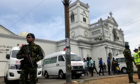 Sri Lankan military officials stand guard in front of the St Anthony’s Shrine church in Colombo after an explosion.