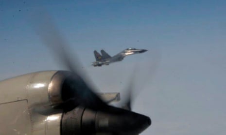 Image from video provided by the US department of defense, shows an intercept of a US warplane by Chinese aircraft. The Pentagon has released footage of intercepts of US warplanes by Chinese aircraft.