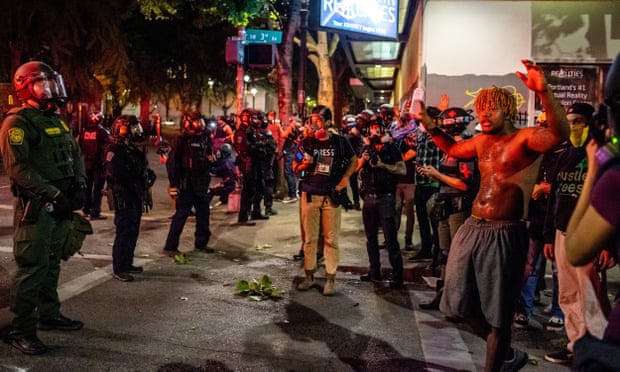 Protesters and federal agents on Wednesday night in Portland, Oregon.
