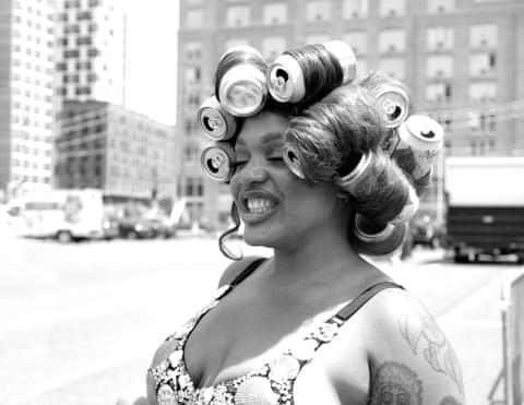 a woman with coke bottles in her hair