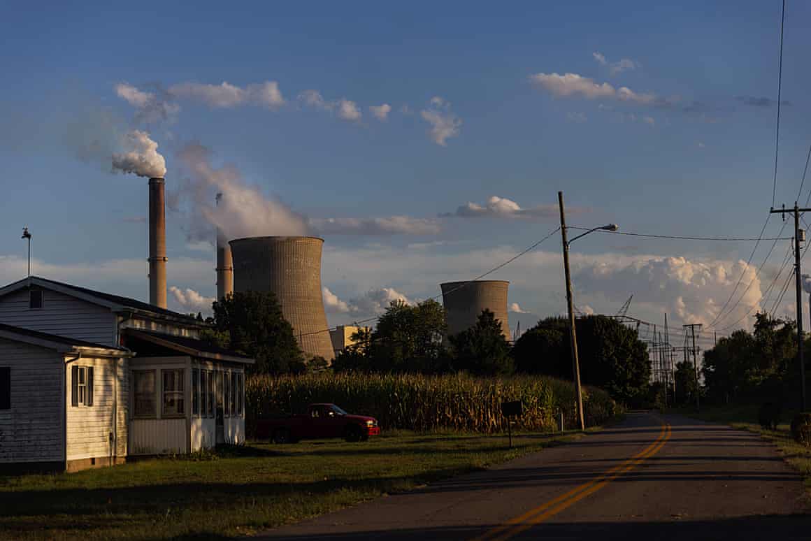 Smoke rises from chimneys at the power plant