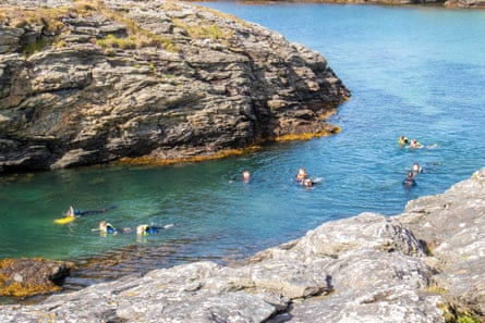Snorkellers swim Porth Castell’s natural gully