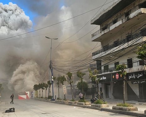 Smoke plumes billow from the site of an Israeli air strike in the southern suburbs of Beirut