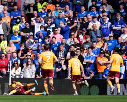 Motherwell celebrate a goal at Ibrox.