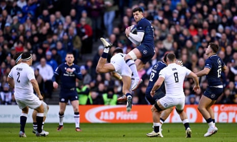 Scotland’s Blair Kinghorn claims a high ball whilst under pressure from Henry Slade of England.