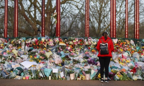 A memorial site at the Clapham Common Bandstand in London in March 2021, following the kidnapping and murder of Sarah Everard.