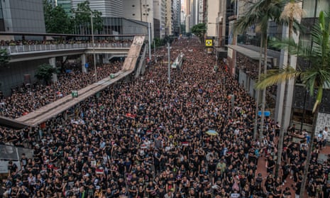 Protesters demonstrate against the now-suspended extradition bill on 16 June in Hong Kong