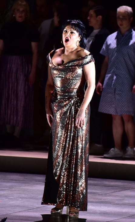 Anna Netrebko singing in shiny dress