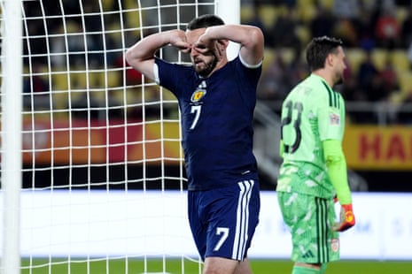 John McGinn celebrates after scoring from the penalty spot to double Scotland’s lead.