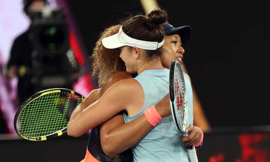 Naomi Osaka is congratulated by her opponent.