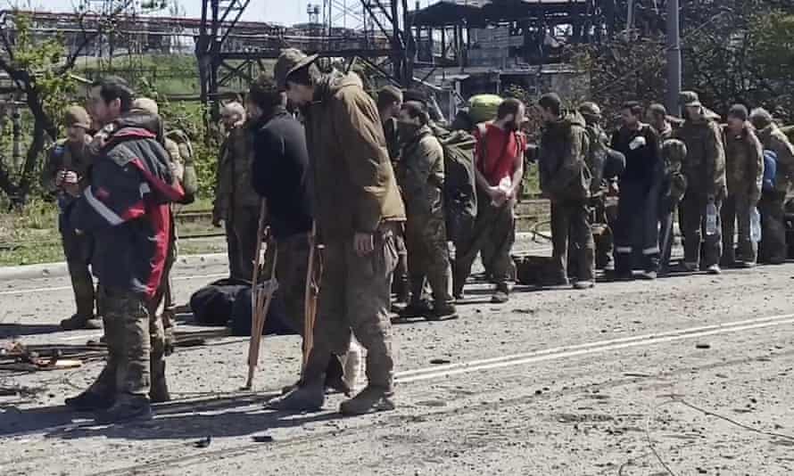 Ukrainian troops leave the besieged Azovstal steel plant in Mariupol, Ukraine.