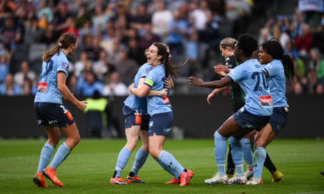 Tobin celebrates her headed goal.