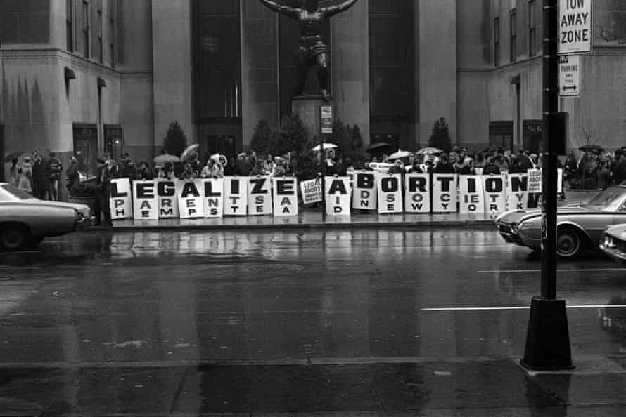 Activists hold a series of signs that read ‘Legalize Abortion’ during a demonstration at New York City’s Rockefeller Center in March 1968.