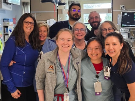a group of people in uniforms smiling
