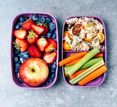 A bento-style lunch box with separated layers and compartments.