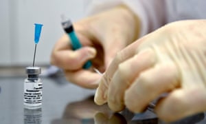 A nurse prepares to inoculate volunteer Ilya Dubrovin, 36, with Russia’s new coronavirus vaccine in a post-registration trials at a clinic in Moscow on September 10, 2020.