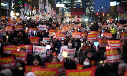 ‘Let’s build a democratic government’ during a rally in Seoul on Friday.