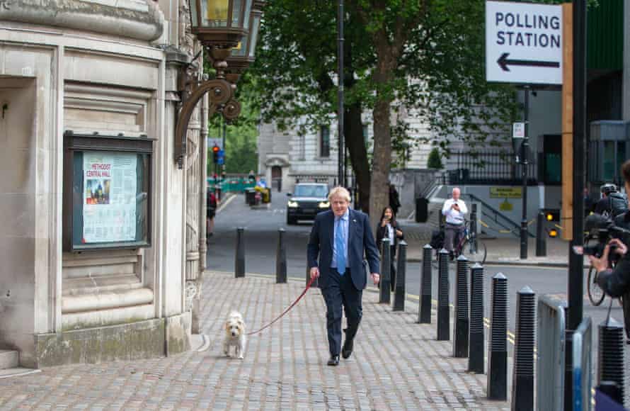 Boris Johnson voting in Westminster today, with his dog Dilyn.