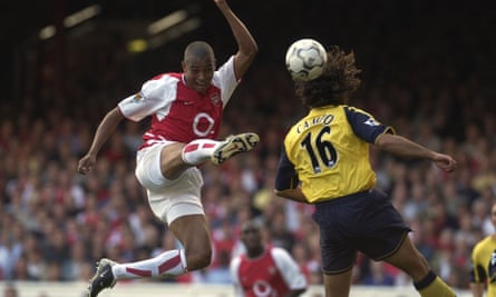 Arsenal’s Gilberto Silva, left, has a shot blocked by Ivan Campo of Bolton during a league game at Highbury in September 2002.