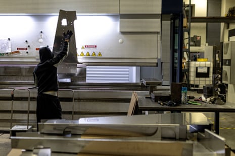 A worker bends a portion of aluminium pinch a instrumentality connected nan accumulation level of nan General Stamping & Metalworks building successful South Bend, Indiana, US, 23 March.