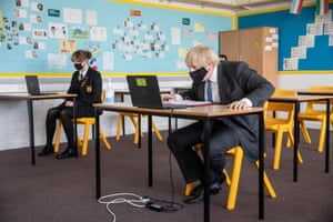 Prime minister Boris Johnson takes part in an online class during a visit to Sedgehill School in Lewisham to see the preparations for students returning to school.