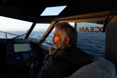 A member of Ridlers support team in a boat