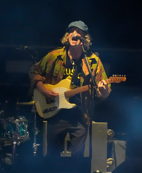 John Power of Cast on stage at Principality Stadium.