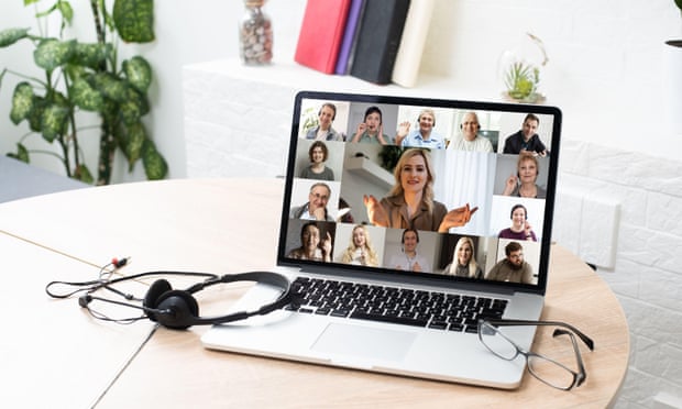 A videoconference meeting on a laptop screen