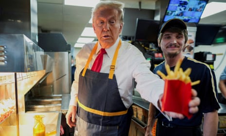 Donald Trump serves chips at a McDonalds in Pennsylvania in October 2024.