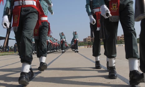 Pakistani soldiers march in a parade