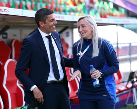 Francisco Neto, head coach of Portugal, interacts with Belgium’s Elisabet Gunnarsdottir.
