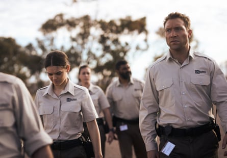 Sharee (Rose Riley) and Cam Sandford (Jai Courtney) as guards at Barton immigration detention centre in Stateless.