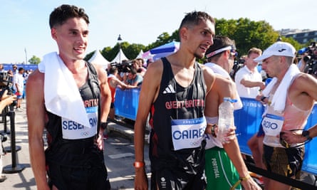 Great Britain’s Philip Sesemann and Emile Cairess at the finish of the men’s marathon